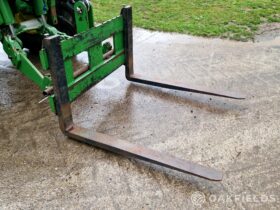 Linkage mounted carriage & pallet forks full