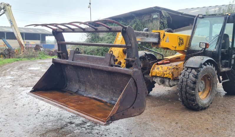 JCB Q-fit Dung Bucket full