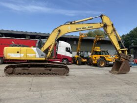 NEW HOLLAND – KOBELCO E305 full